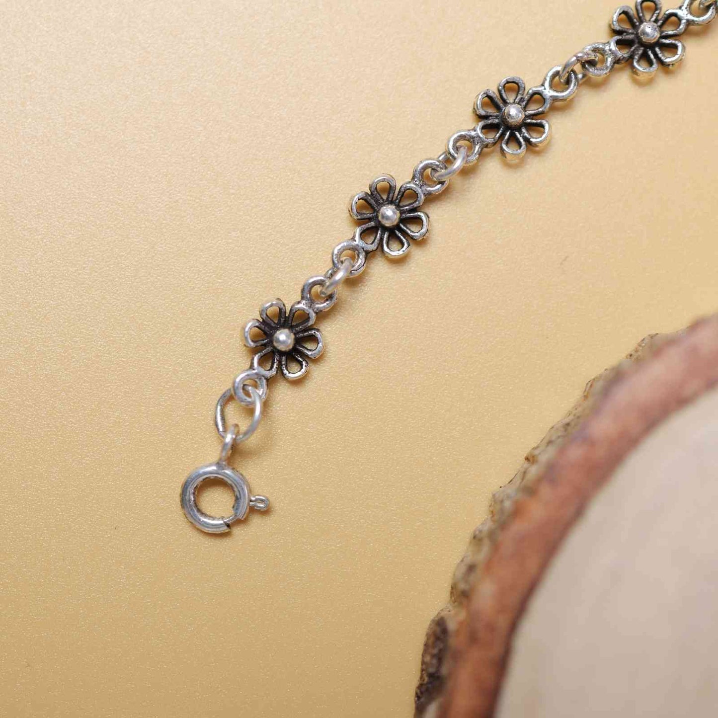 Petal Glow Oxidised Silver Bracelet
