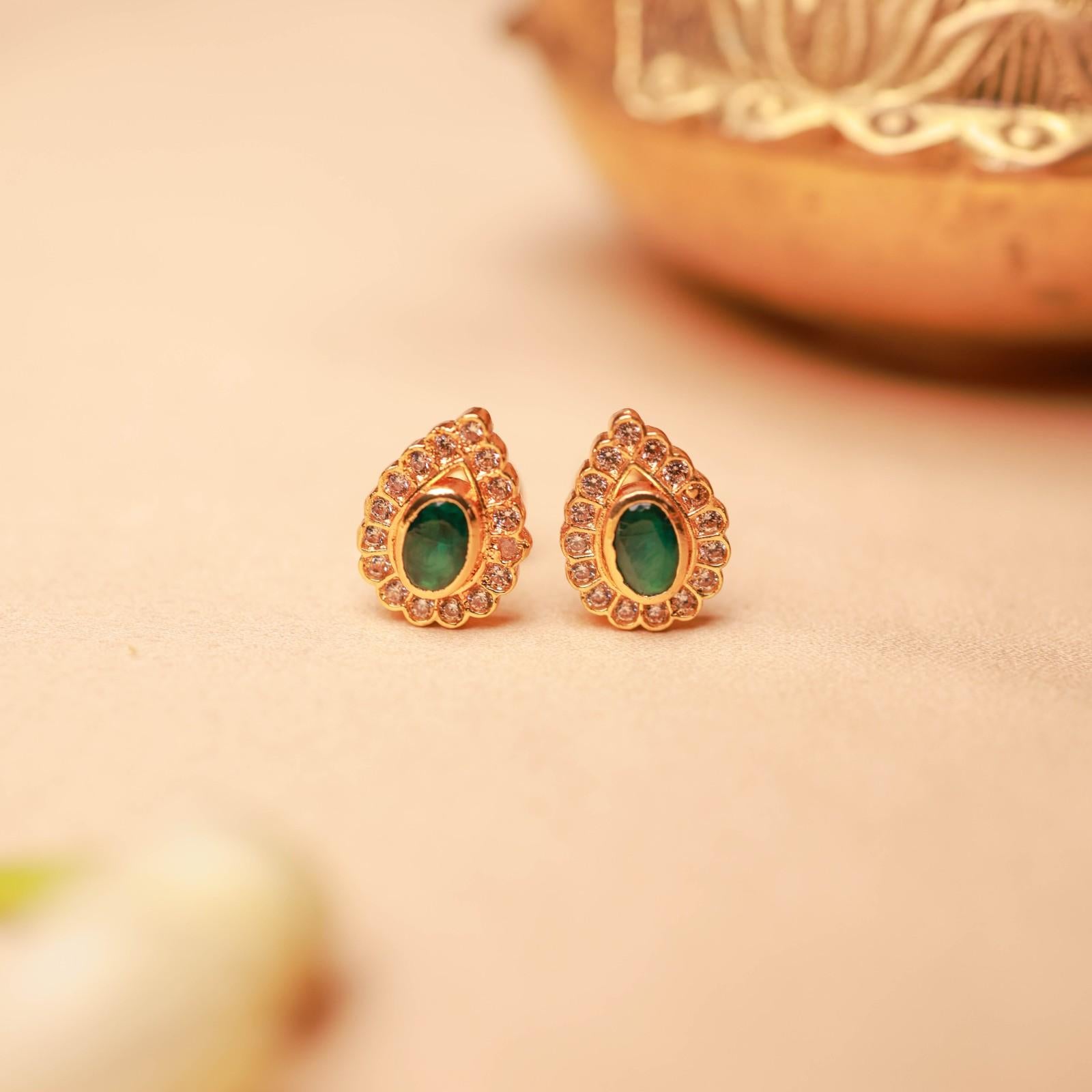 Gold plated teardrop stud earrings with emerald stone and crystal halo by Silalankaraa.