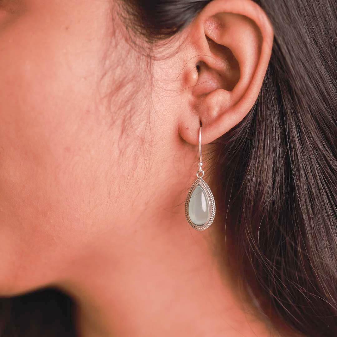 White chalcedony teardrop earrings in 925 sterling silver.