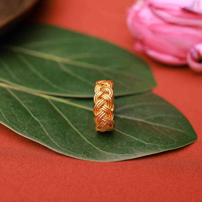 Gold plated braided knot ring with intricate woven design by Silalankaraa.