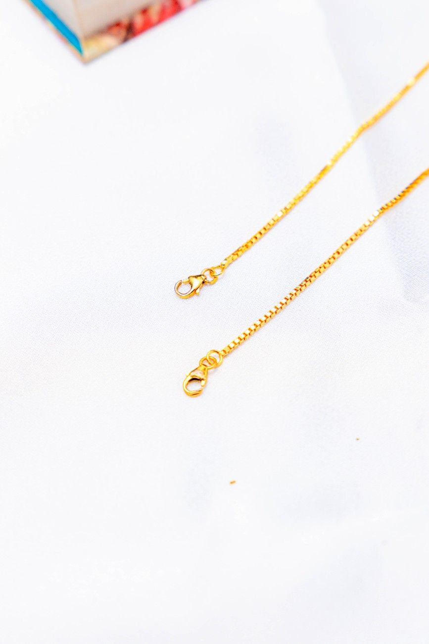 92.5 sterling silver gold plated green stone lotus anklets for women.