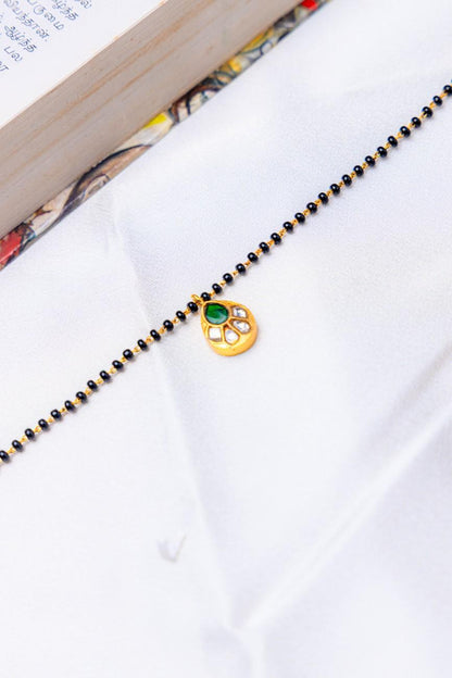 Silver Gold-Plated Mangalsutra Bracelet with Green Stone Pendant