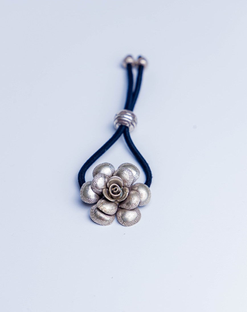 Beautiful handcrafted silver floral Two-in-one hairband and bracelet.