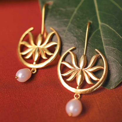 Sterling silver temple-inspired floral earrings with pearl drop from Silalankaraa.