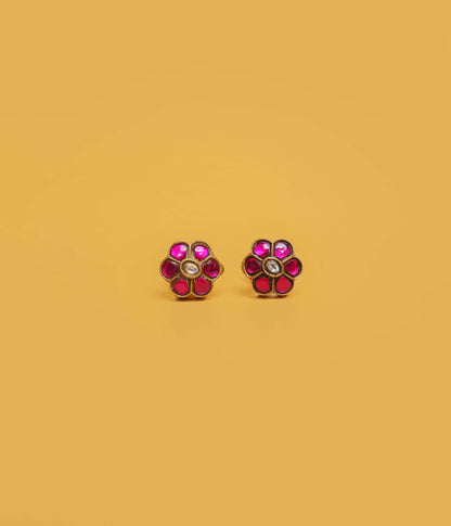 Ruby blossom gold plated stud earrings in 92.5 sterling silver with floral stone design.