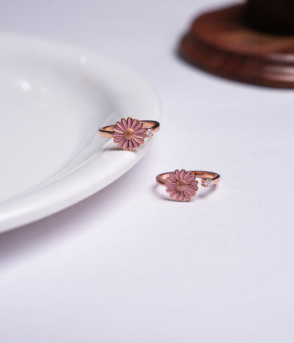 Rose-plated toe ring with pink daisy flower and sparkling CZ stone