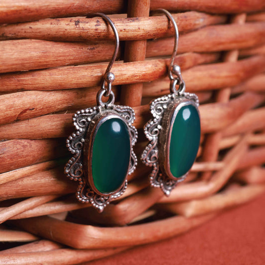 Green onyx oval drop earrings in 92.5 sterling silver.