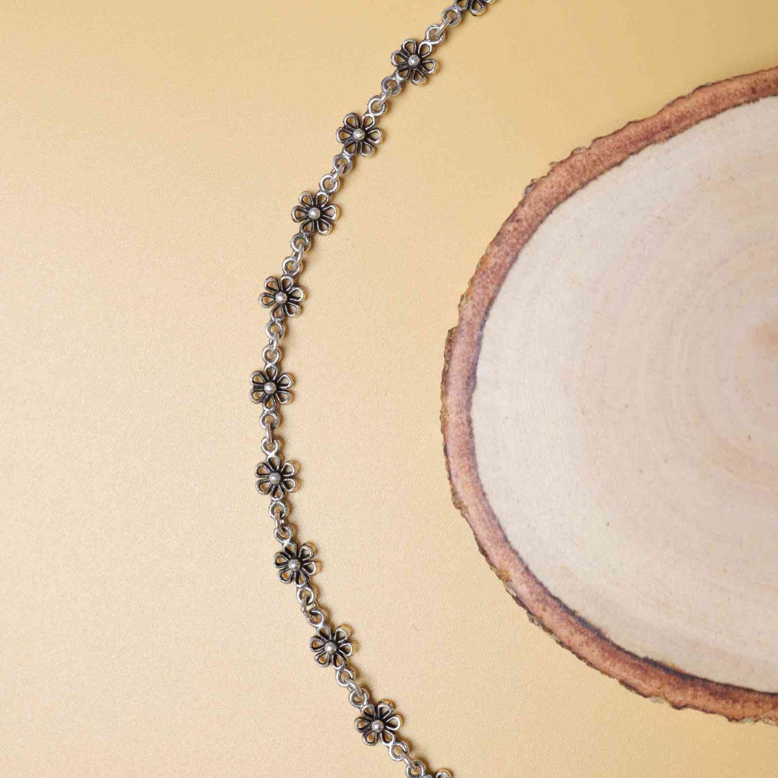Handcrafted Floral Silver Bracelet with Oxidised Vintage Detailing.