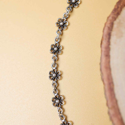 Petal Glow Oxidised Silver Bracelet