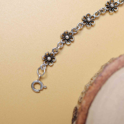 Petal Glow Oxidised Silver Bracelet