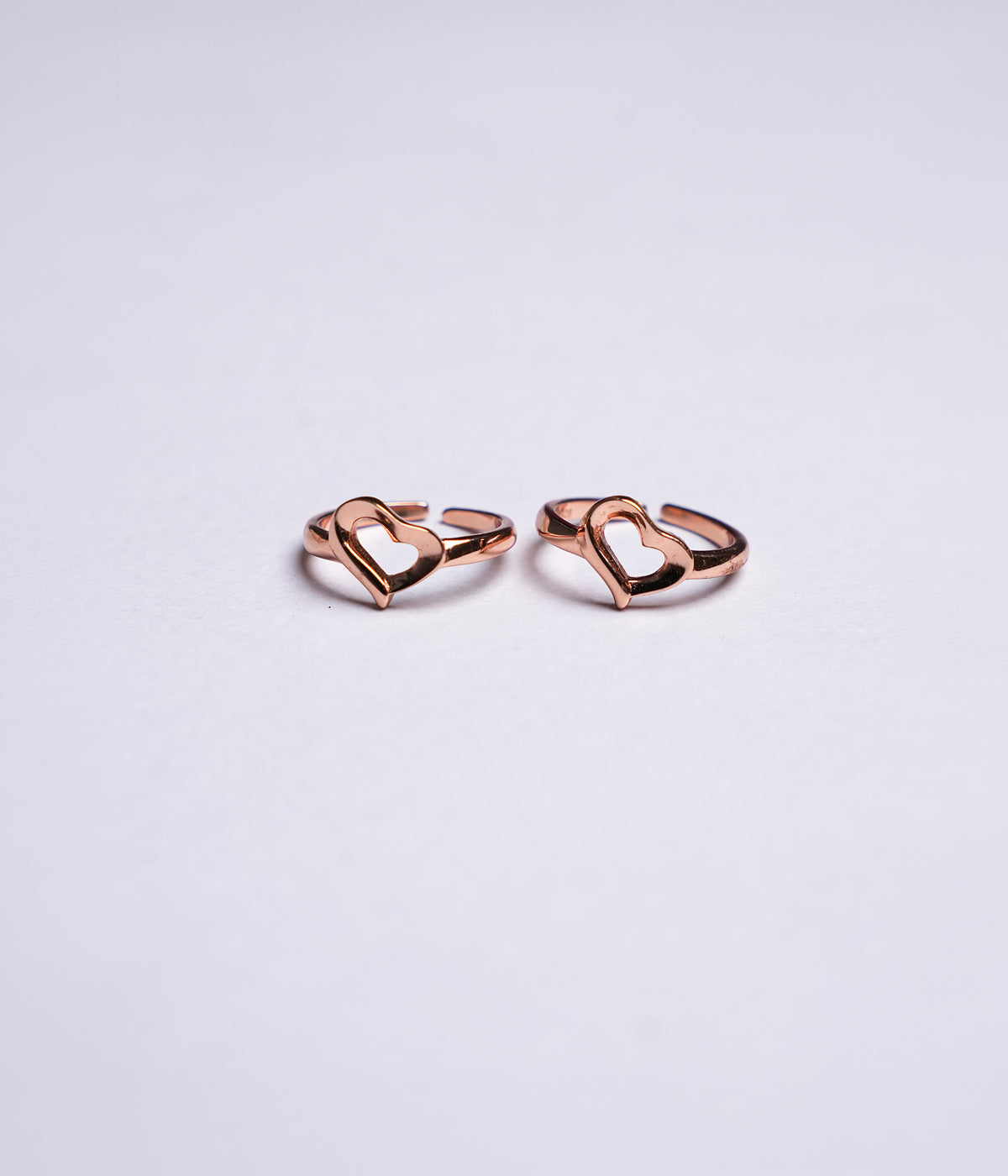 Rose gold plated 92.5 sterling silver toe ring with open heart design.