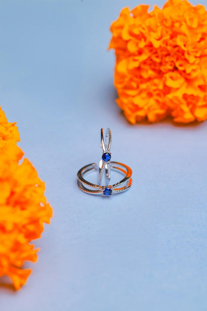 Sterling Silver Adjustable Toe ring with blue stone detailling.