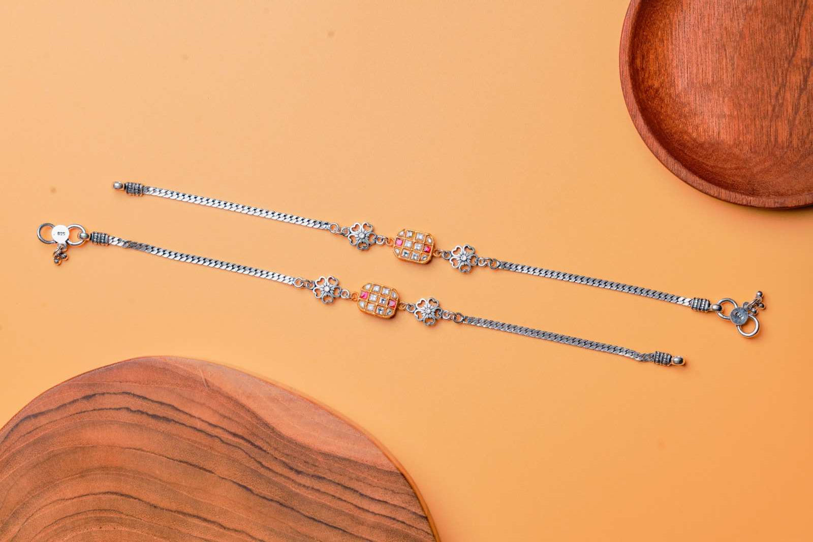 Dual-Toned Floral Charm Silver Anklets.