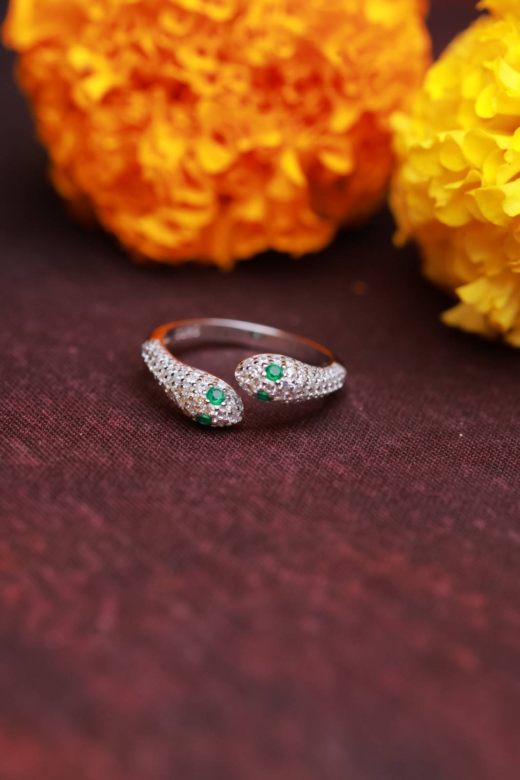 Silver Twin Serpent Ring with Green Stone Accents