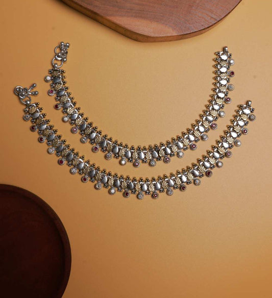 Antique handcrafted silver anklet with temple motifs and kemp stones.