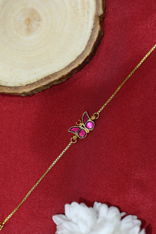 Gold Plated Bracelet featuring a Pink Stone Butterfly charm.
