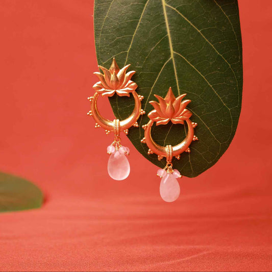 Shop handcrafted Rose Quartz Lotus Halo Silver Earrings in gold-plated 925 sterling silver. Featuring lotus motifs, halo hoops, and pink gemstone drops, perfect for festive, ethnic, and occasion wear.