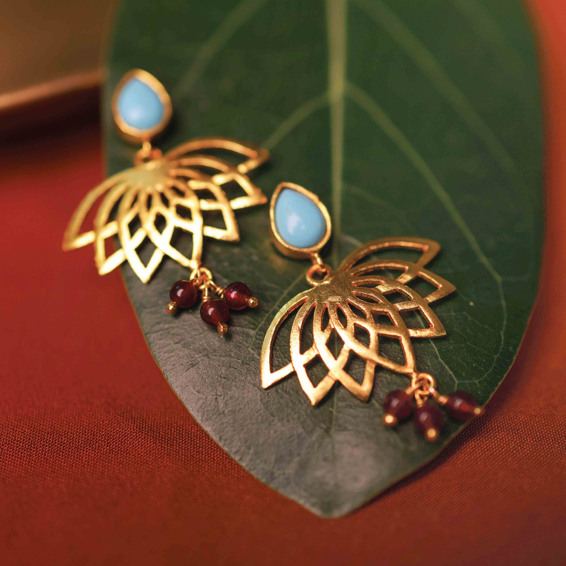 Gold Plated Lotus Bloom Garnet Drop Earrings.