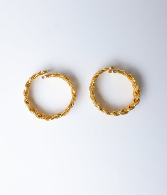 Gold-plated 92.5 sterling silver toe ring with intricate braided rope design.